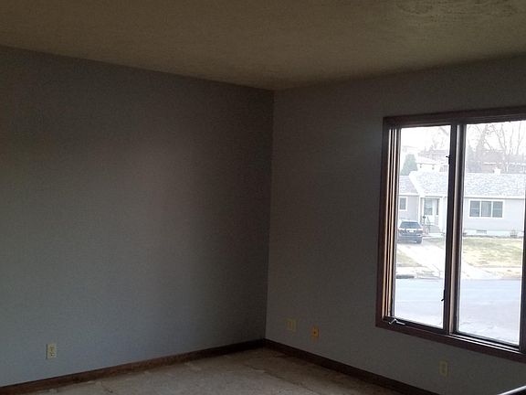 Large living room with plenty of natural light, NEW FLOORING TO BE INSTALLED