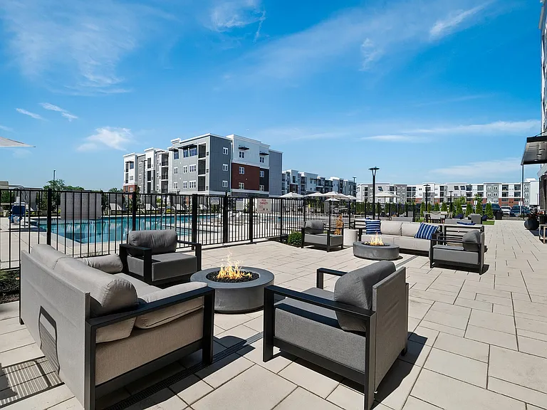 Relax in style at this stunning outdoor lounge, perfect for gatherings and unwinding by the fire.