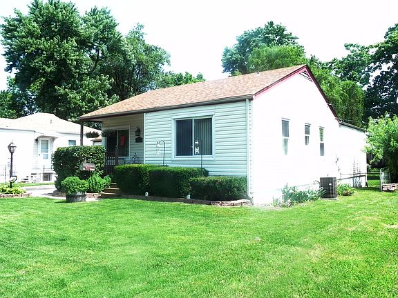 Mature, manicured lawn.