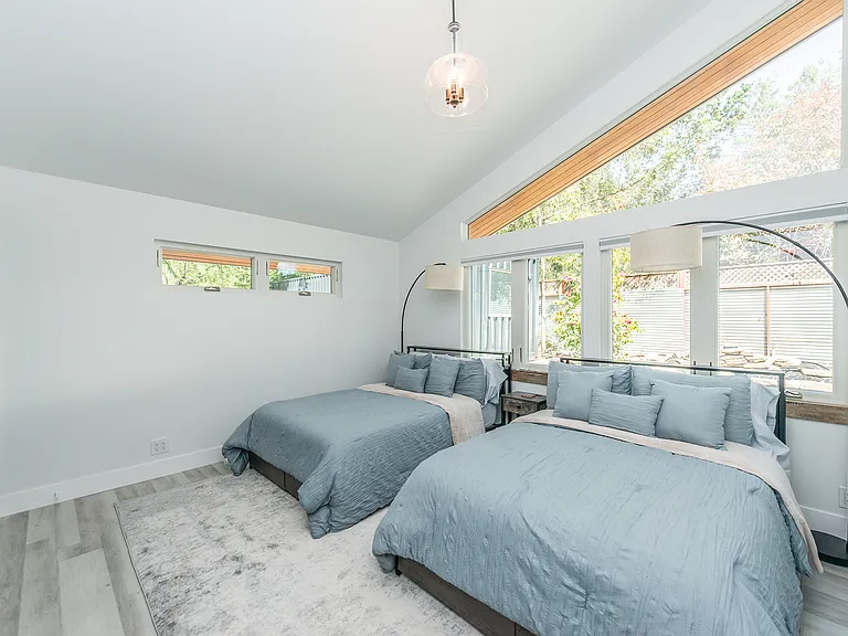 Secondary bedroom configured with two beds