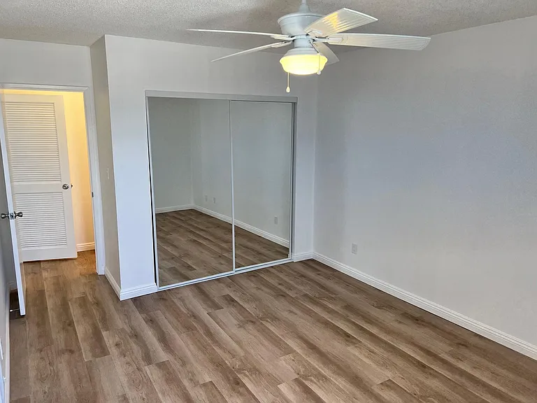 Standing at bedroom window looking toward hallway in 1x1