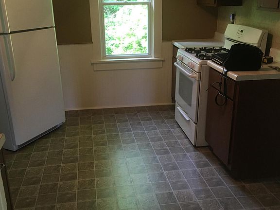 New kitchen floor -fresh paint and newer appliances-Also add