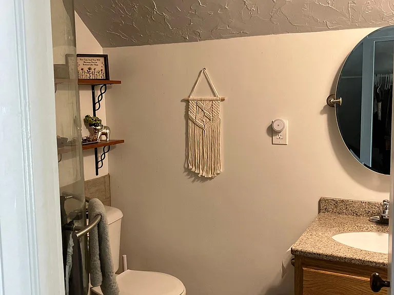 tiled bathroom with adjustable heated floor