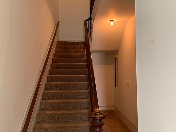 Staircase to this 2nd floor studio apt