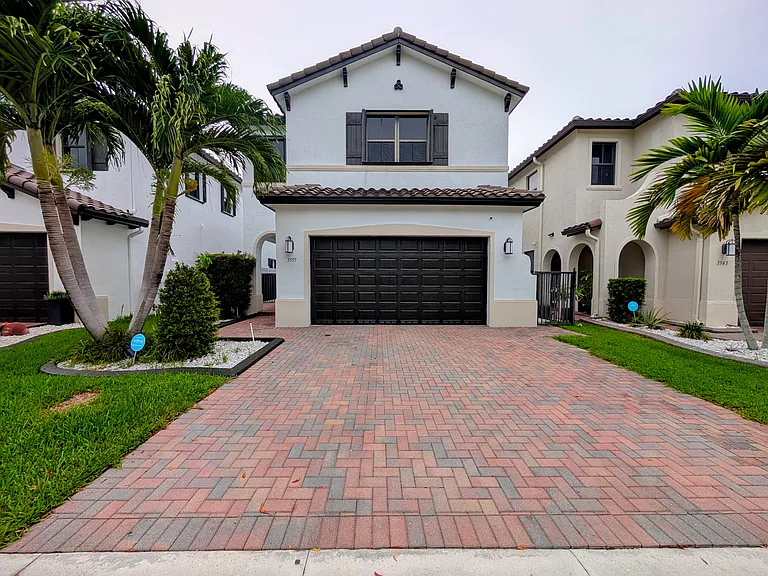 -Freshly painted exterior and newly cleaned, sealed pavers (Completed April 2026).
-Complete accordion hurricane shutters for all windows