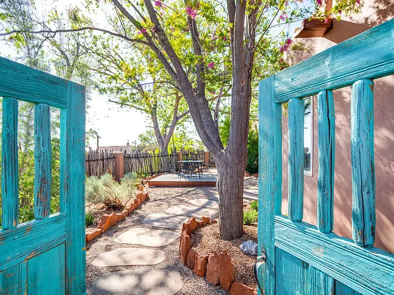 Entryway to private courtyard with plenty of seating options