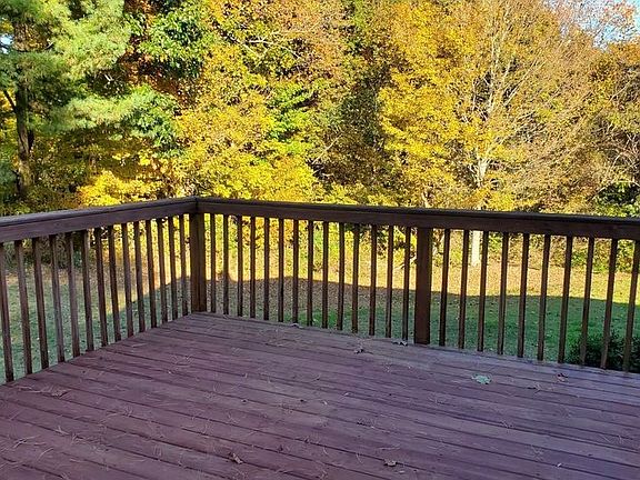 Deck view overlooking your beautiful wooded property.