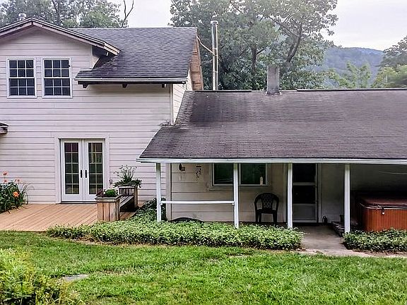 Patio, and porch w/hot tub