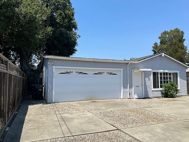 Outside studio with attached garage. Garage is not accessible to tenants Parking is in front of cottage window.