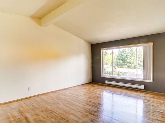 Vaulted ceilings in the living room make for a light-filled, open space!