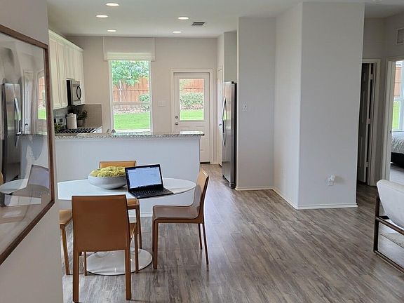 Virtually staged picture of dining area.