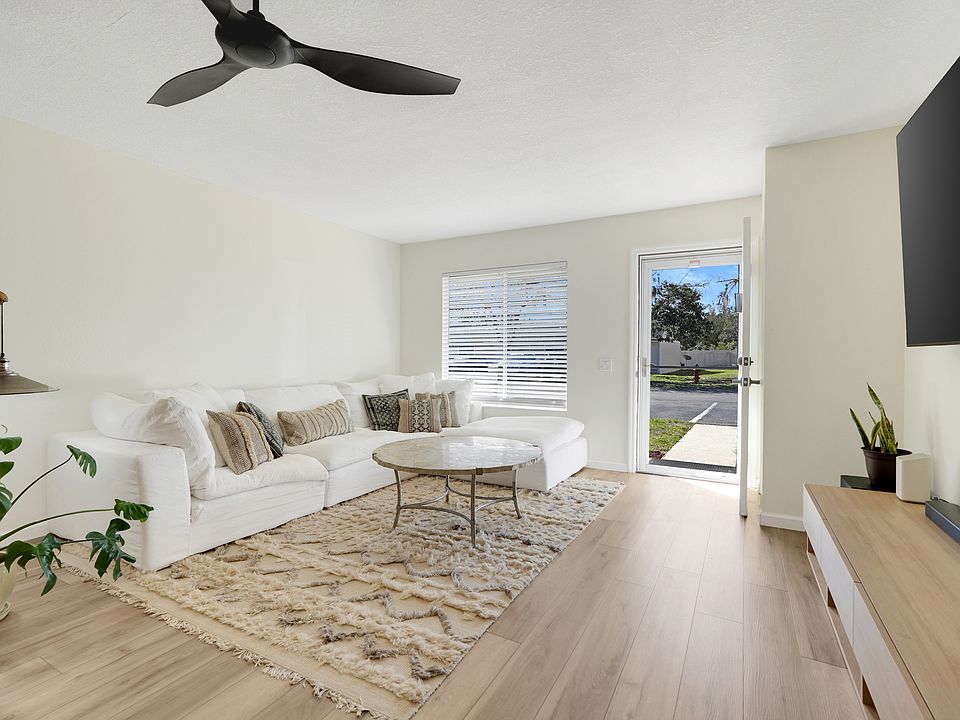 Expansive living area featuring large windows and excellent natural light throughout.