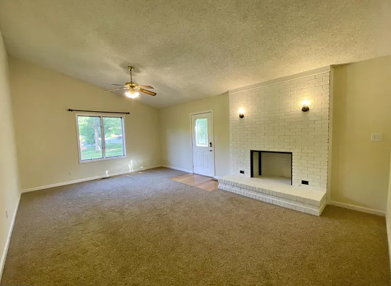 Vaulted ceiling! Check out the ceiling fans!