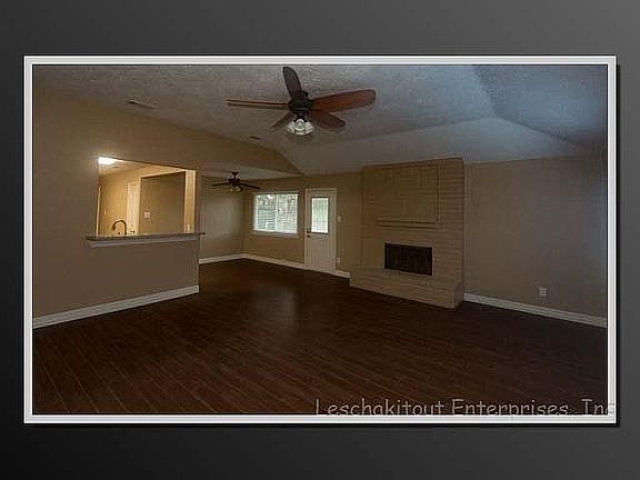 Spacious living room with cozy fireplace