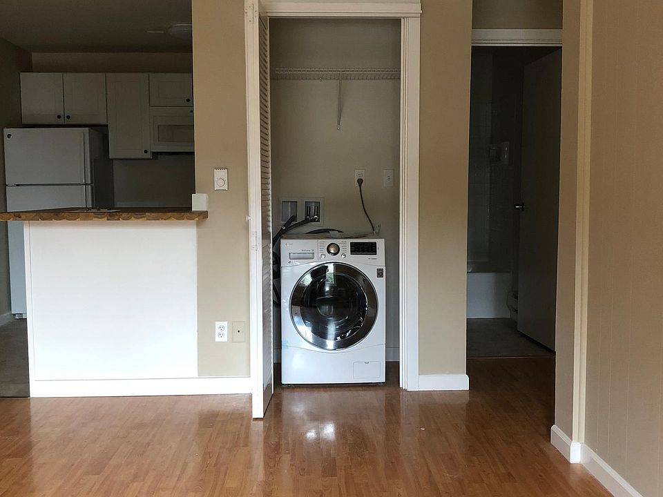 Closet in the great room has European style clothes washer/dryer