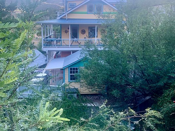 Studio/Guest cottage and house viewed from High Road