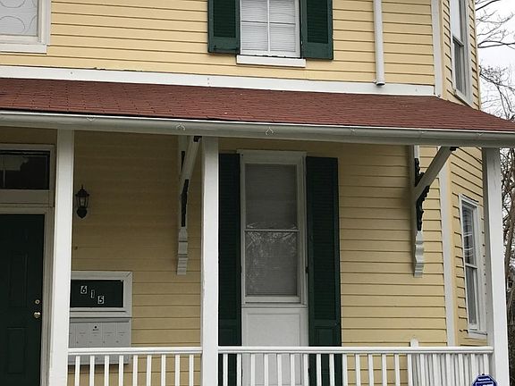 Apartment is on the first floor of this house.