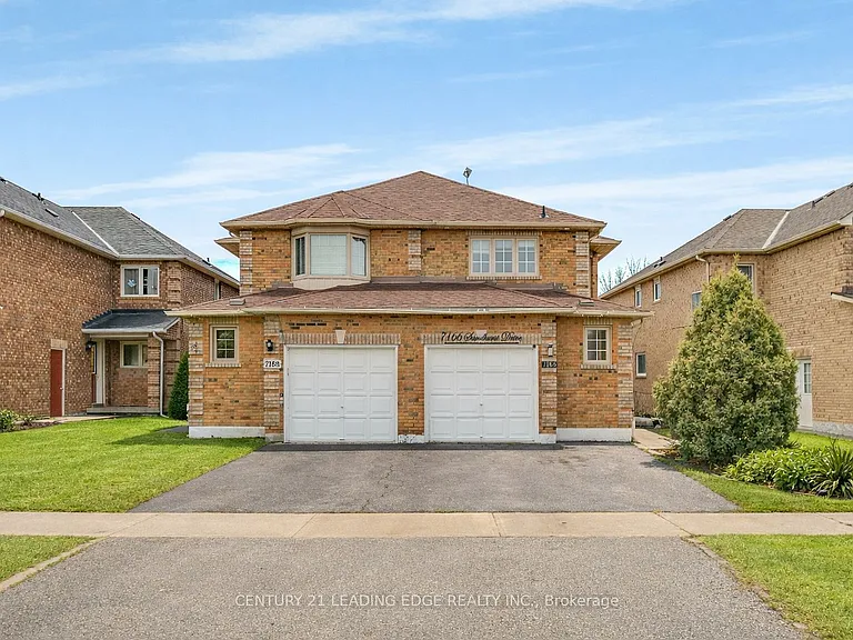 7166 Sandhurst Dr — Photo 1