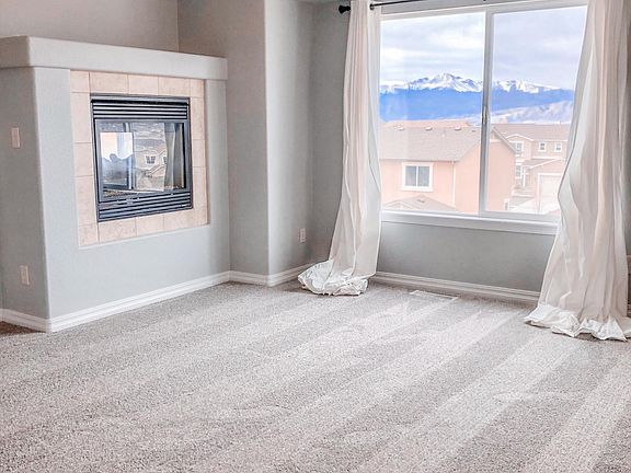 Master bedroom (with new carpet!) Beautiful view of Pikes Peak!