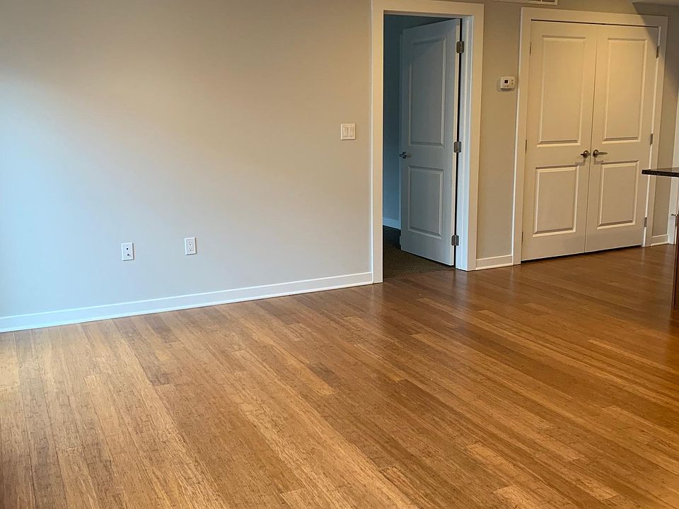 Living Area & Utility Closet Next To Entrance