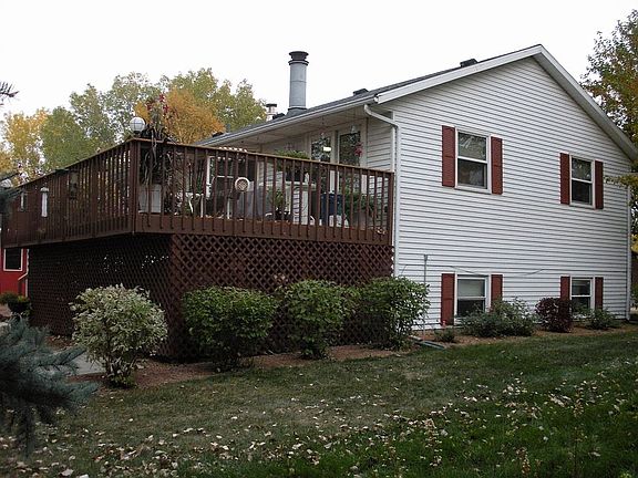 Large Deck Overlooking The Backyard