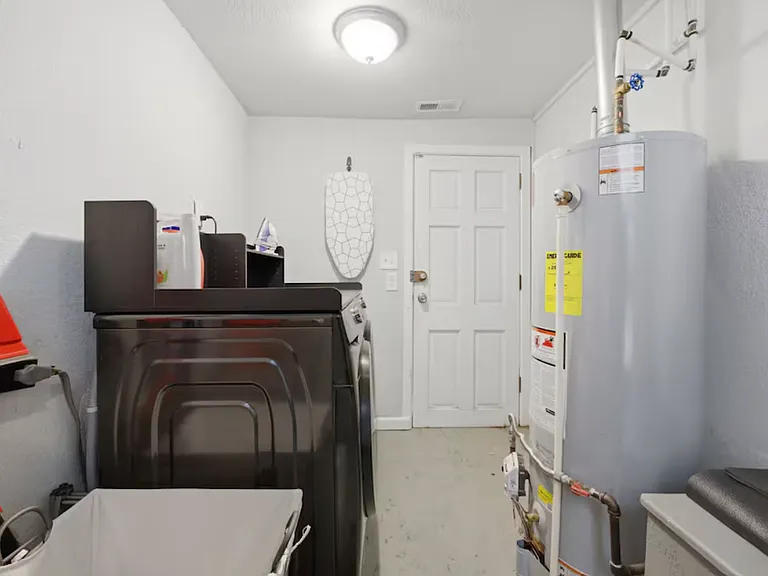 A practical, dedicated laundry and utility space that keeps the chores tucked away and organized.