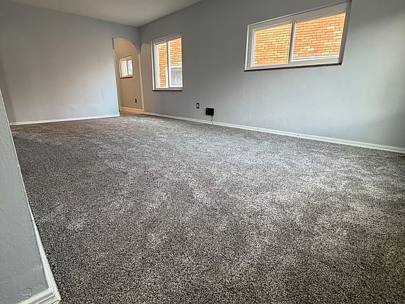 Looking from foyer into large living room.