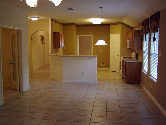Ceramic Tile Family, Kitchen, Breakfast Room and Entry.  New Upgraded Carpet