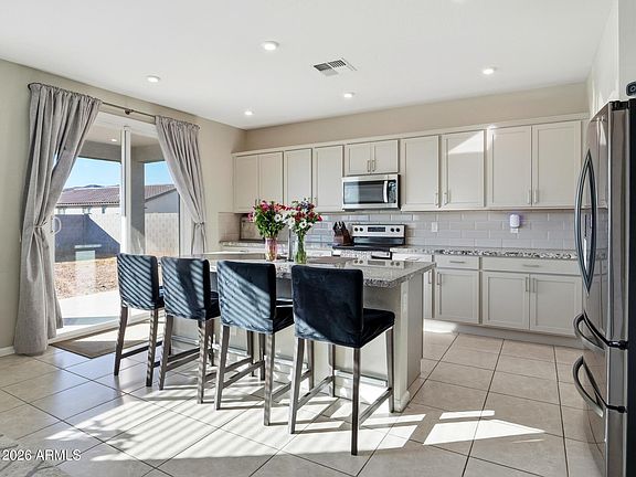 3rd image of 2037 E WETLEAF Place