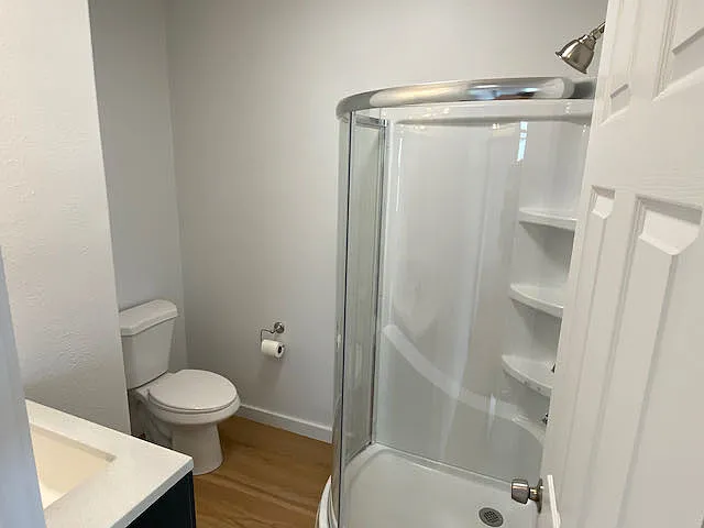Fresh and modern shared bathroom with half moon shower