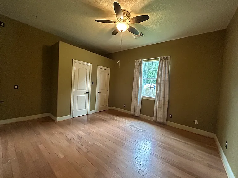 3rd bedroom facing back yard with large closet