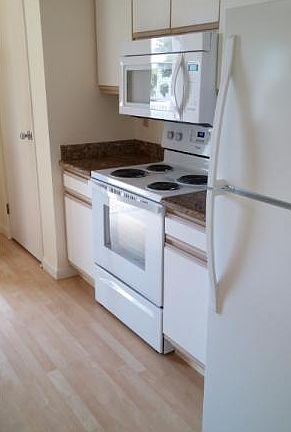 Kitchen. Microwave above range.