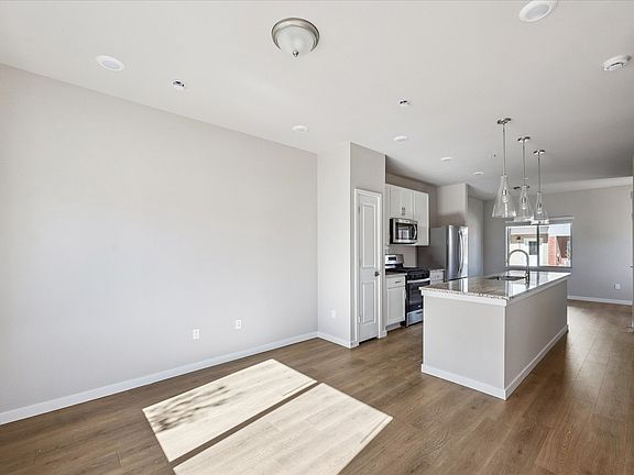 Room on either side of kitchen for dining, living room or home office