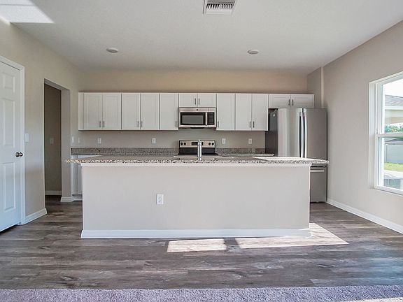 5th image of 1372 Axel Cir
