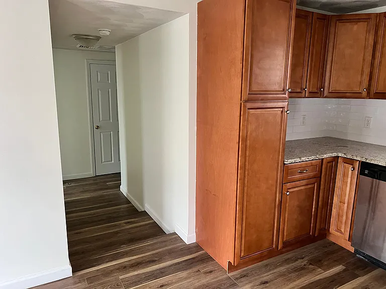 Hallway to Primary Bedroom, Laundry and Storage