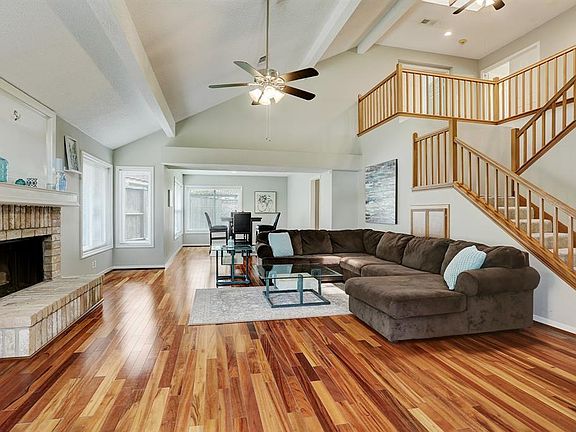 The formal living room flows into the dining room.