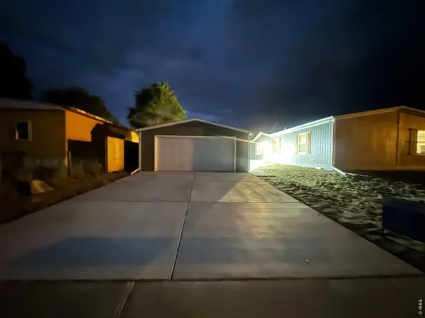 103 Beach Dr, Log Lane Village, CO 80705