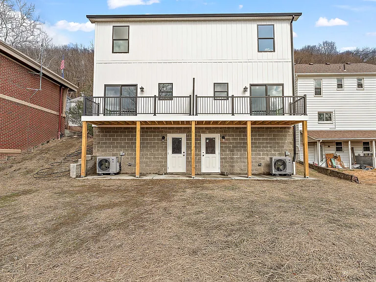 Back of house - Deck, Basement Door to backyard