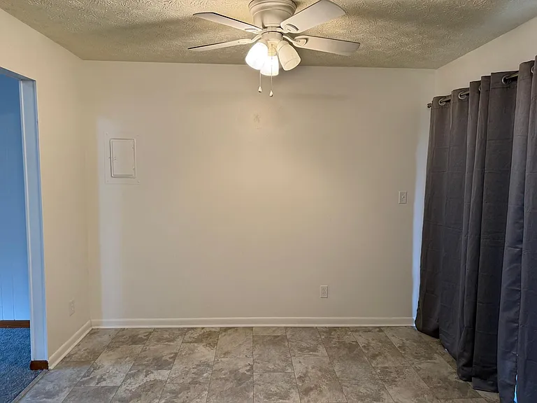 Extra large eat-in kitchen with private door to open for light and fresh air! No neighbors behind apartment - absolutely private, peaceful and quiet - just like a home!