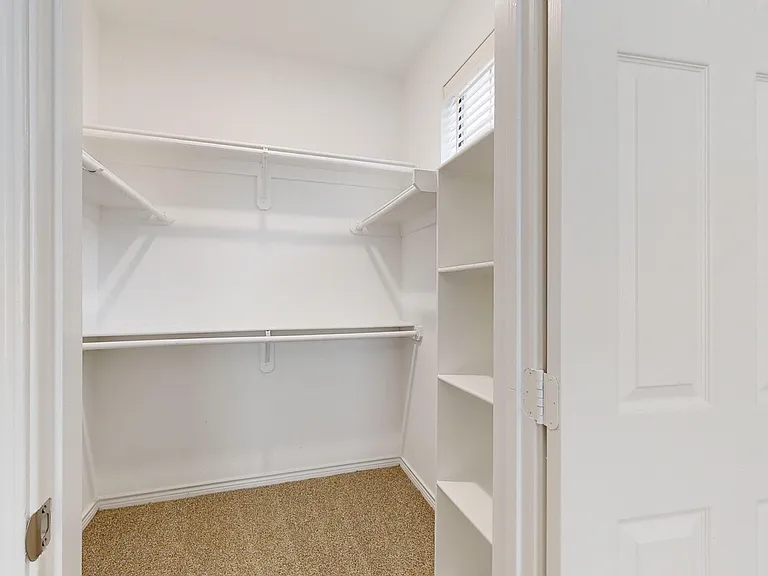 Walk-In Closet with Built-In Storage