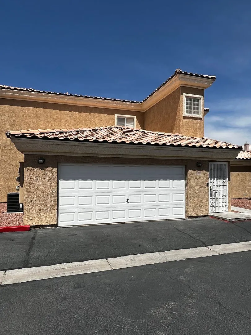 Charming Condo with Private Two-Car Garage in a Gated Community — Photo 1