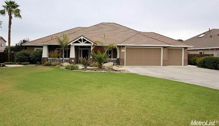 This stunning custom built home sits on over 1/2 acre lot and offers everything you could possibly want in your dream home! Attention to detail was carefully considered and crafted at every turn. Built in 2006, this home features 4 bedrooms, 3 full bathro