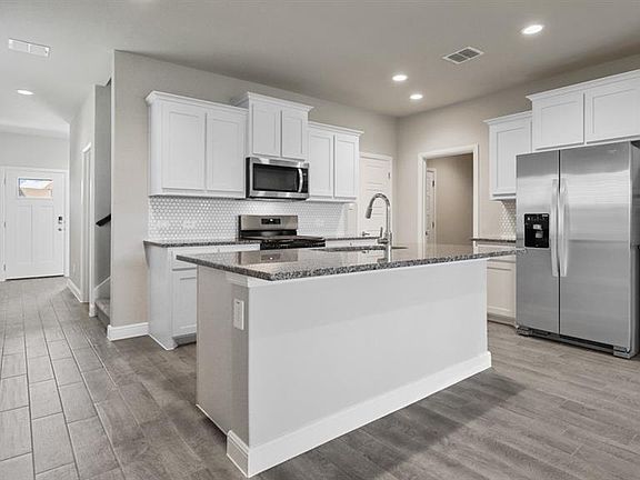 Kitchen - All Home and community information, including pricing, included features, terms, availability and amenities, are subject to change at any time without notice or obligation. All Drawings, pictures, photographs, video, square footages, floor plans, elevations, features, colors and sizes are approximate for illustration purposes only and will vary from the homes as built.