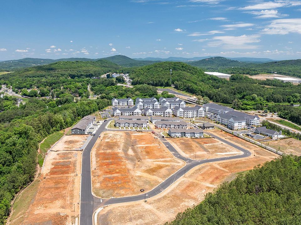 Aerial of Stegall Village with mountains and sports complex