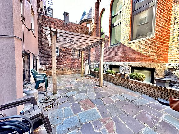 Private paved patio backyard