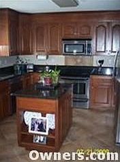 New stainless steel appliances and tile floors