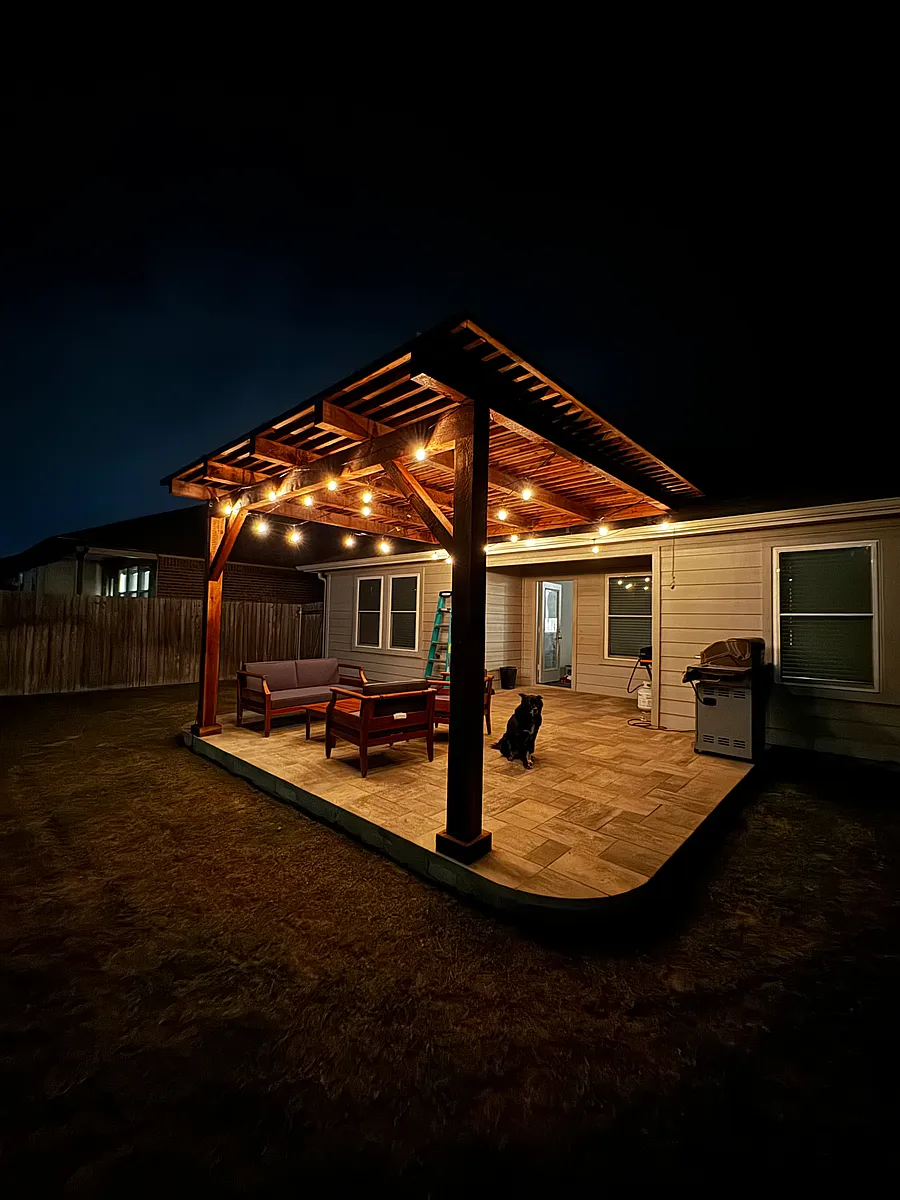 Stone back patio with pergola - 21021 Price Daniel Dr