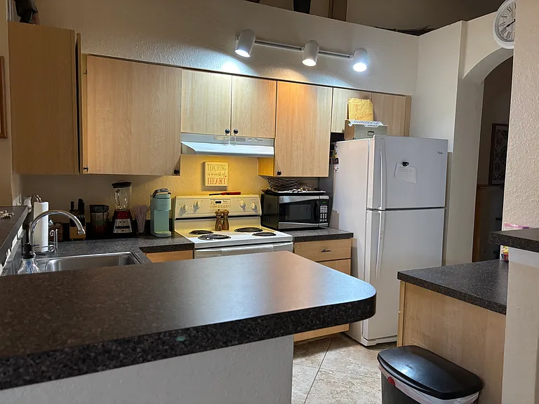 The kitchen is stocked with keurig, microwave, blender, toaster, all silverware and cooking utensils as well as pots and pans!