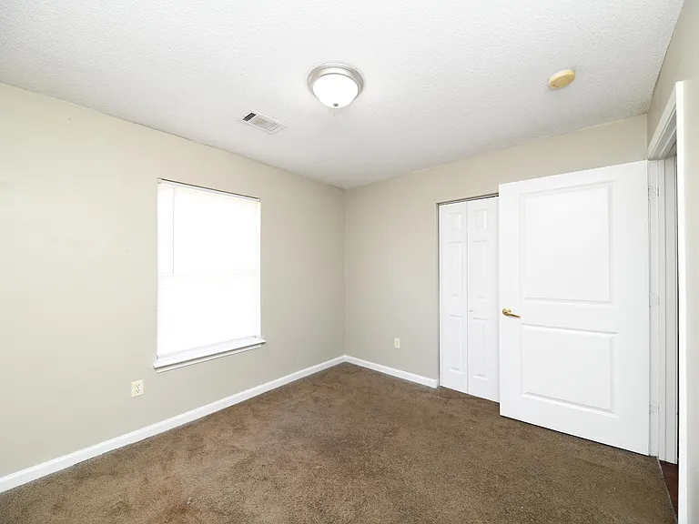 Bedroom with overhead lighting