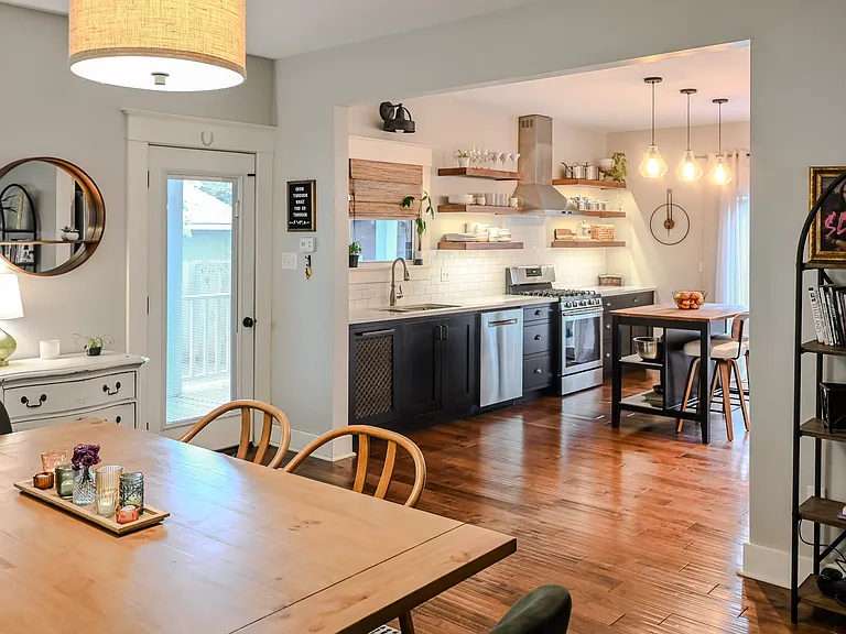 Open living and dining into kitchen.
